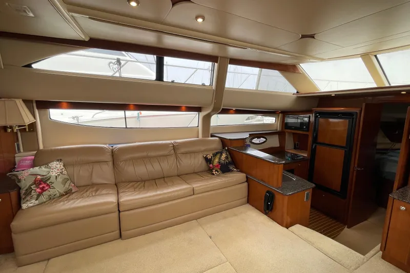 Slide: The Image of Luxurious interior of 2006 Meridian 459 Motoryacht with leather seating and modern amenities. - 25