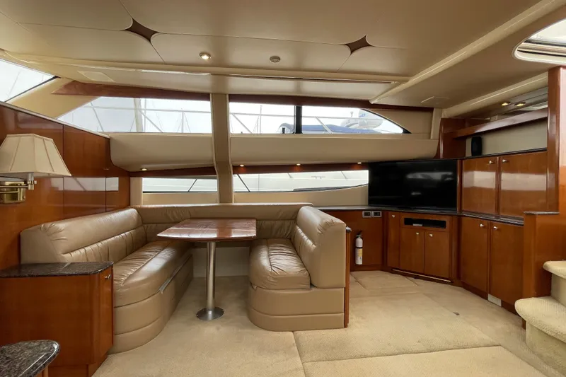 Slide: The Image of Luxurious interior of 2006 Meridian 459 Motoryacht with leather seating and wood finishes. - 26