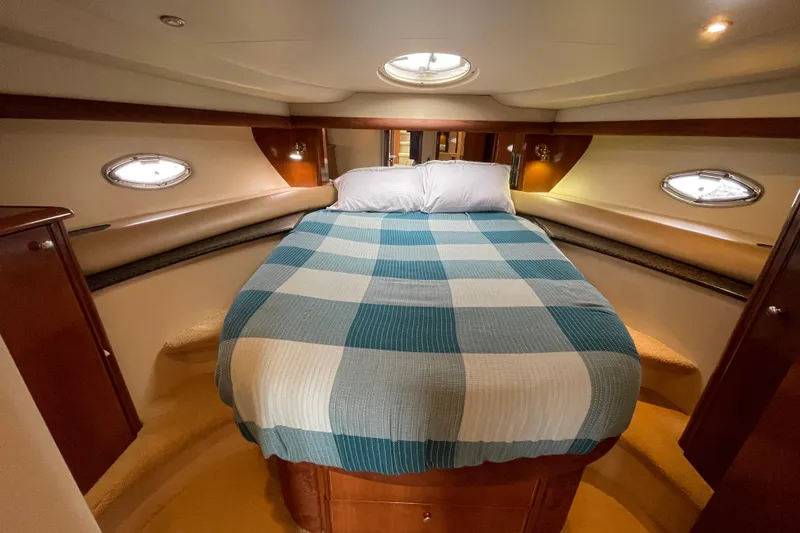 Slide: The Image of Luxurious bedroom interior of 2006 Meridian 459 Motoryacht with cozy bed and elegant design. - 33