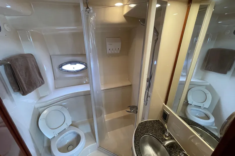 Slide: The Image of Bathroom interior of 2006 Meridian 459 Motoryacht with shower, toilet, and sink. - 37