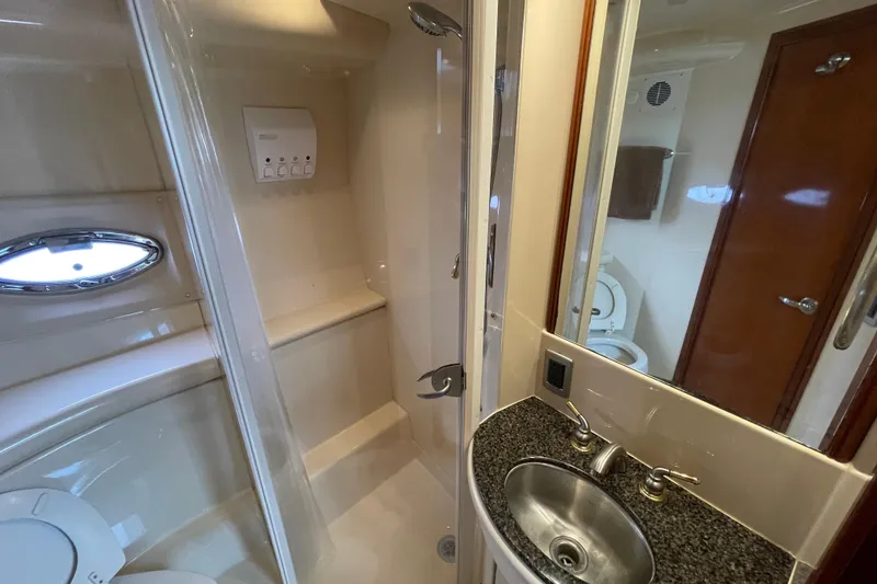 Slide: The Image of Luxurious bathroom in 2006 Meridian 459 Motoryacht with shower, sink, and toilet. - 38