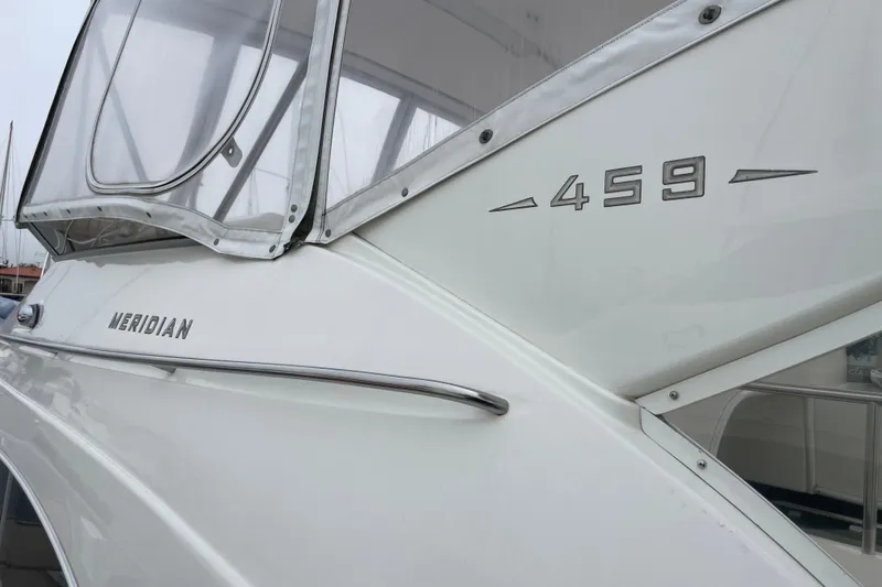 Slide: The Image of 2006 Meridian 459 Motoryacht, side view with model name and number visible. - 55