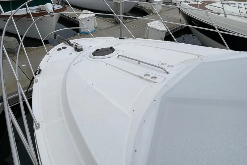 Slide: The Image of 2006 Meridian 459 Motoryacht bow view at marina dock. - 56