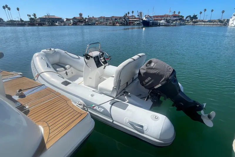 Slide: The Image of Inflatable boat with Yamaha motor docked beside 2006 Meridian 459 Motoryacht. - 75