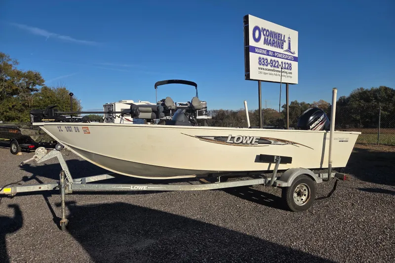 The Image of 2017 Lowe Fishing Machine 160 Pro boat on trailer at O'Connell Marine. - 0