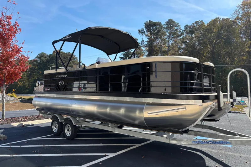 Slide: The Image of 2026 Veranda VISTA VIEW 22RC pontoon boat on trailer, parked outdoors. - 3