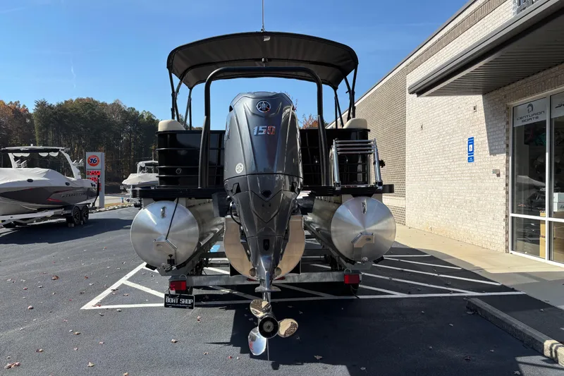 Slide: The Image of 2026 Veranda VISTA VIEW 22RC pontoon boat with Yamaha 150 engine, parked outdoors. - 4