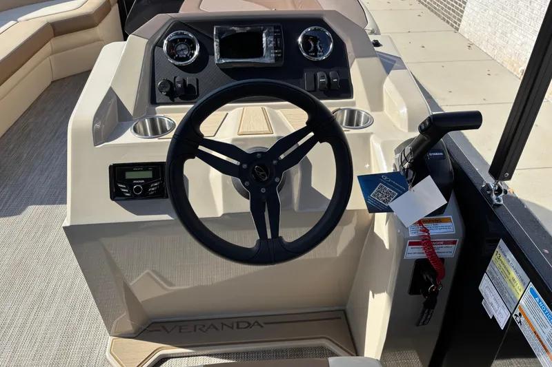 Slide: The Image of 2026 Veranda VISTA VIEW 22RC boat dashboard with steering wheel and controls. - 8