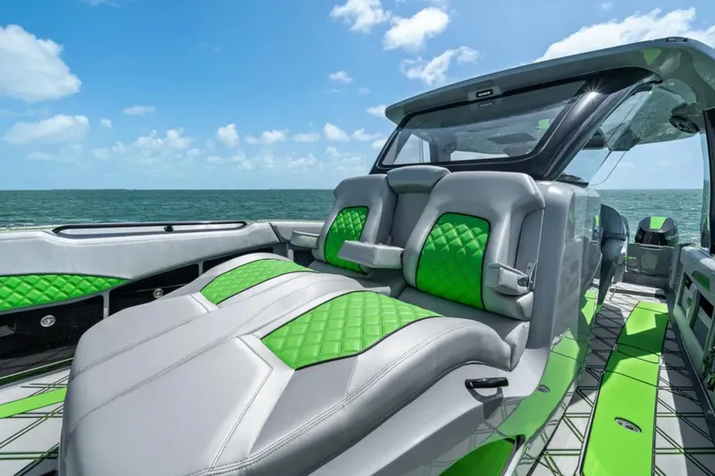 Slide: The Image of 2026 Deep Impact 399 Sport boat interior with modern design on open water. - 14