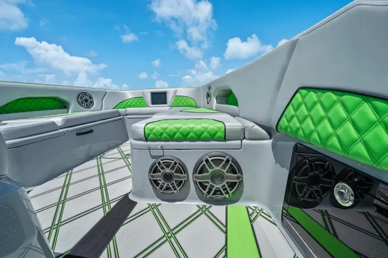 Slide: The Image of Interior of 2026 Deep Impact 399 Sport boat with modern seating and ocean view. - 16
