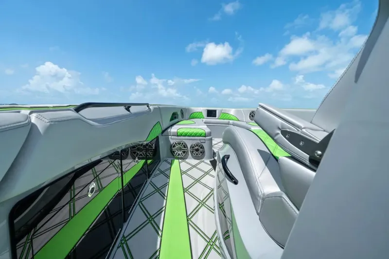 Slide: The Image of Luxurious interior of 2026 Deep Impact 399 Sport boat with modern design and green accents. - 20