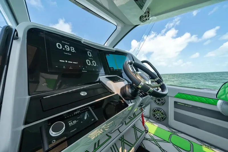 Slide: The Image of Interior of 2026 Deep Impact 399 Sport boat, featuring modern bathroom amenities. - 21