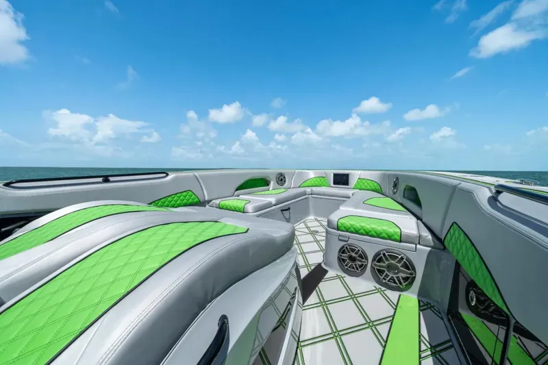 Slide: The Image of Interior of 2026 Deep Impact 399 Sport boat with modern dashboard and steering. - 9