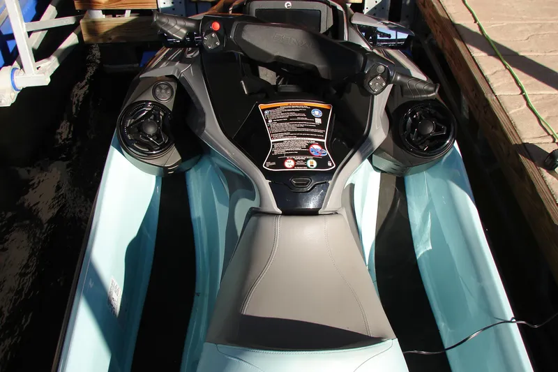 Slide: The Image of 2022 Sea-Doo Wake Pro 230 jet ski, top view, docked, featuring control panel and speakers. - 6