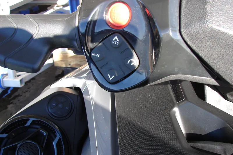 Slide: The Image of Close-up of 2022 Sea-Doo Wake Pro 230 handlebar controls and buttons. - 9