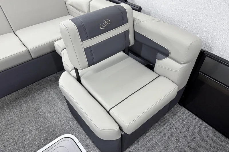 Slide: The Image of 2025 Barletta Cabrio 24U boat interior with luxurious gray seating and modern design. - 11