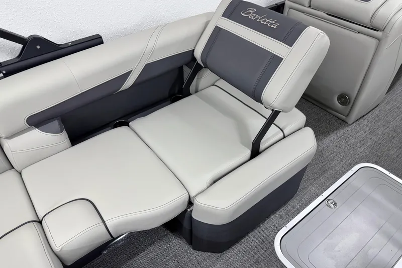 Slide: The Image of 2025 Barletta Cabrio 24U boat interior with luxurious seating and modern design. - 13