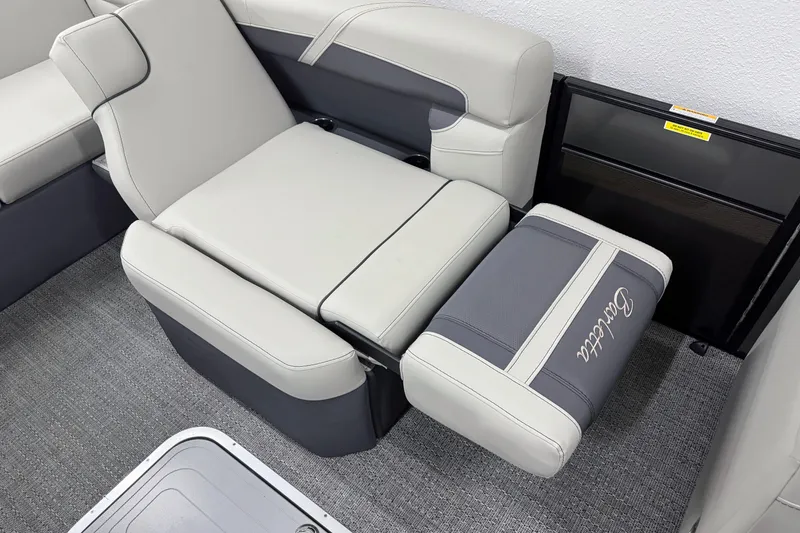 Slide: The Image of 2025 Barletta Cabrio 24U boat interior with luxurious seating and modern design. - 15