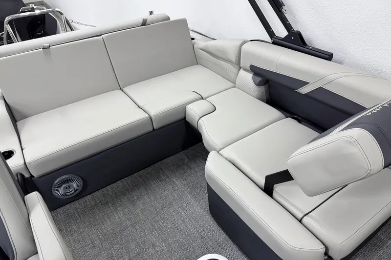 Slide: The Image of Luxurious seating in the 2025 Barletta Cabrio 24U pontoon boat, featuring sleek gray upholstery. - 16