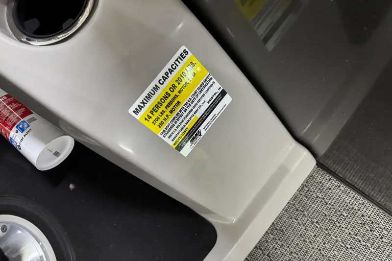 Slide: The Image of 2025 Barletta Cabrio 24U boat capacity label, maximum 14 persons or 2100 lbs. - 28