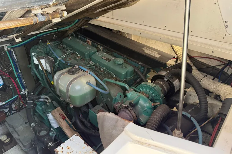 Slide: The Image of Engine compartment of a 1997 Blackfin Combi 33 boat, showcasing mechanical components. - 36