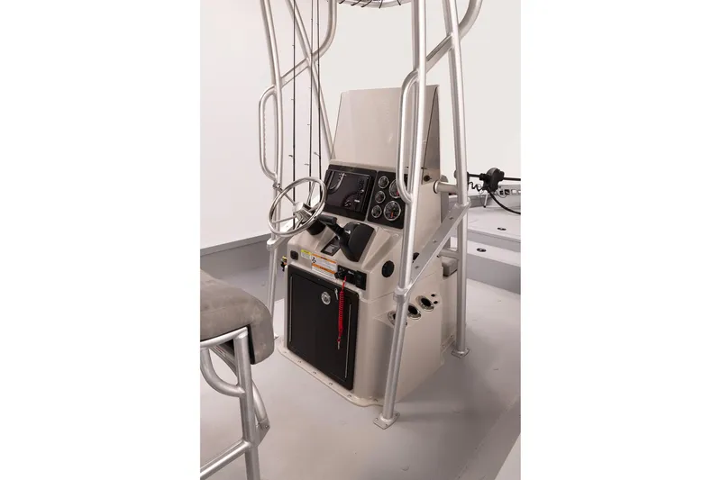 Slide: The Image of 2026 G3 Bay 22 GX boat console with steering wheel and control panel. - 11