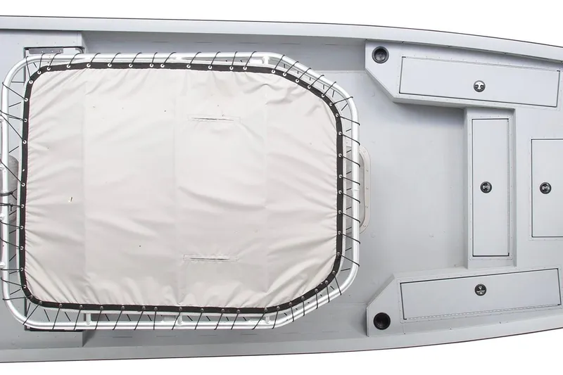 Slide: The Image of 2026 G3 Bay 22 GX boat interior with storage compartments and cushioned seating. - 13