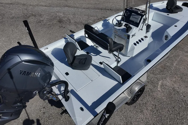 Slide: The Image of 2026 Xpress H22B Bay boat with Yamaha engine and Garmin navigation system. - 6