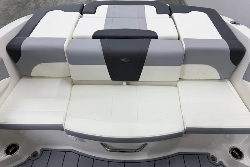 Slide: The Image of 2025 Chaparral 21 SSi boat seating, featuring sleek white and gray upholstery design. - 20