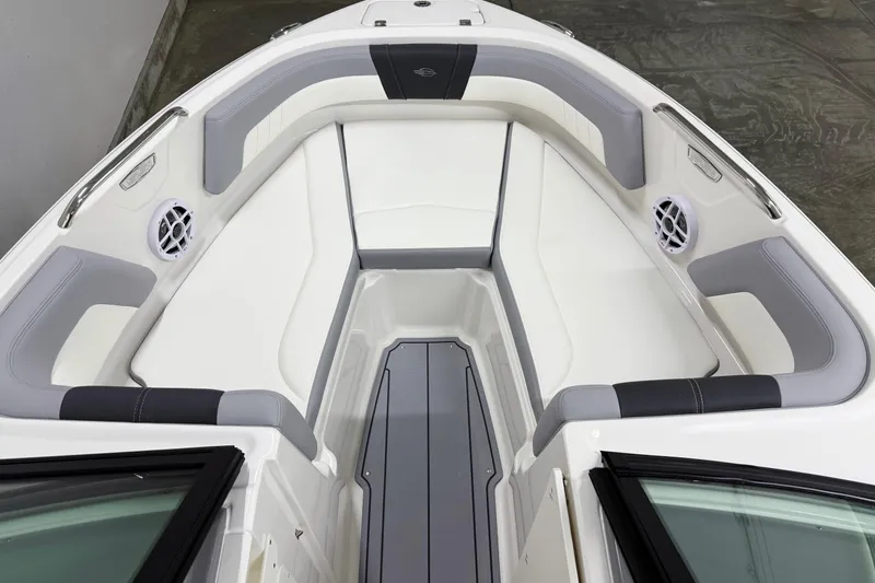 Slide: The Image of 2025 Chaparral 21 SSi boat interior with sleek seating and modern design. - 24