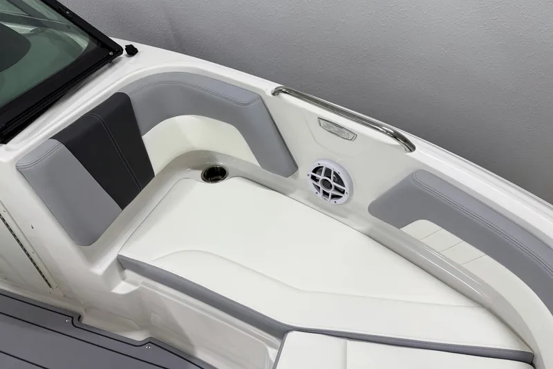 Slide: The Image of 2025 Chaparral 21 SSi boat interior with gray and white seating and speaker. - 25