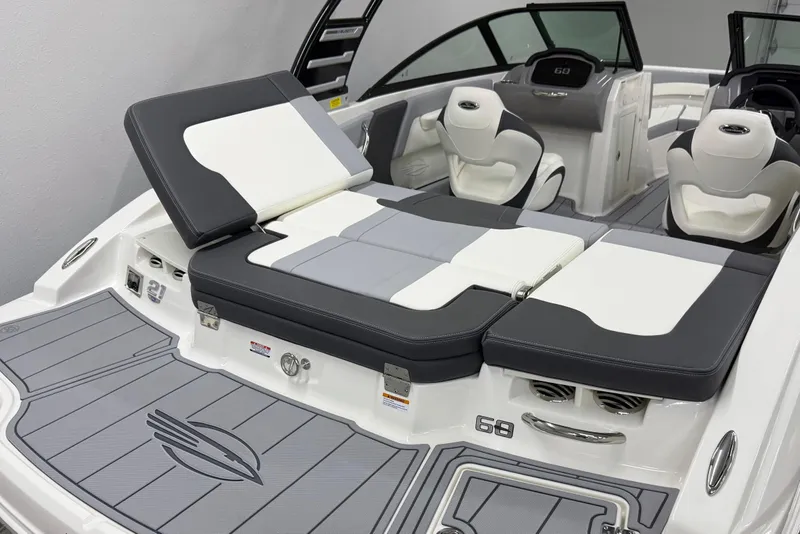 Slide: The Image of 2025 Chaparral 21 SSi boat interior with sleek seating and modern design. - 6