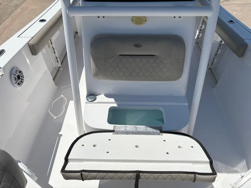 Slide: The Image of 2021 Sportsman Heritage 241 Center Console interior with seating and storage features. - 23