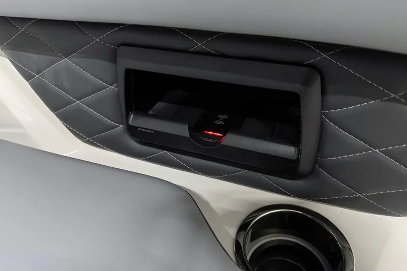 Slide: The Image of 2026 Chaparral 30 SSX interior with quilted leather and integrated charging station. - 17