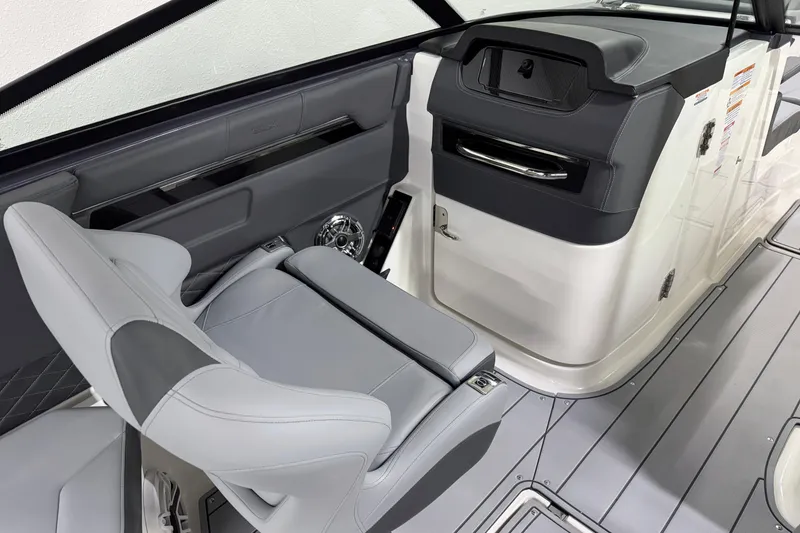 Slide: The Image of 2026 Chaparral 30 SSX boat interior with sleek seating and modern design. - 29