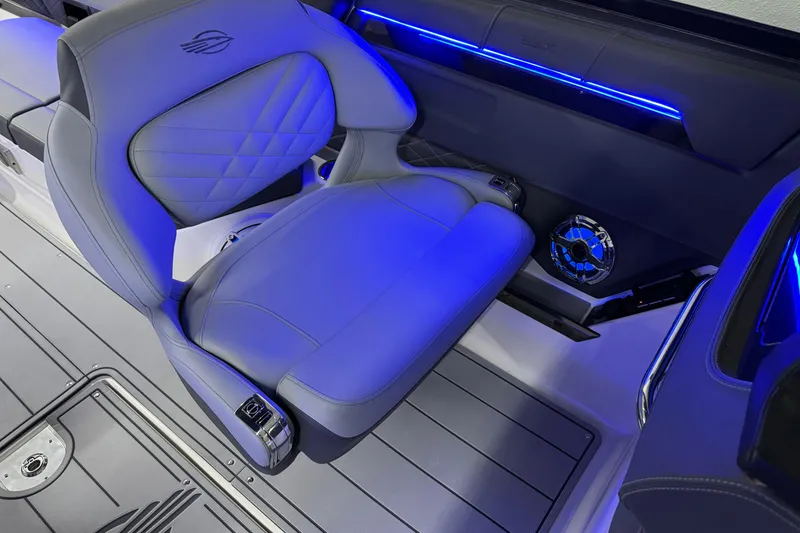 Slide: The Image of 2026 Chaparral 30 SSX boat interior with illuminated seating and modern design. - 33