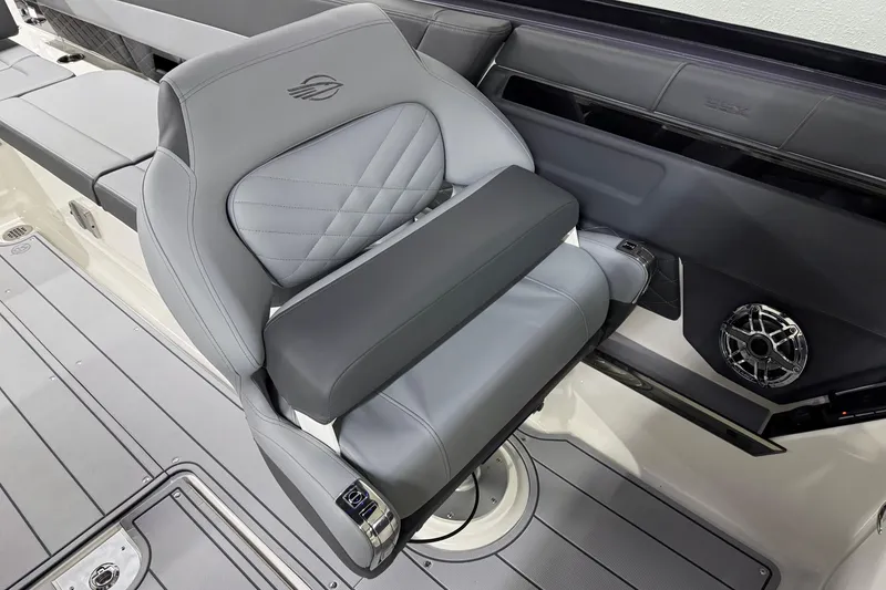 Slide: The Image of Luxury seating in 2026 Chaparral 30 SSX boat with modern design and speaker system. - 34