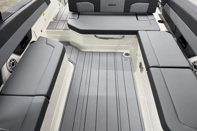 Slide: The Image of 2026 Chaparral 30 SSX boat interior with sleek seating and modern design. - 38