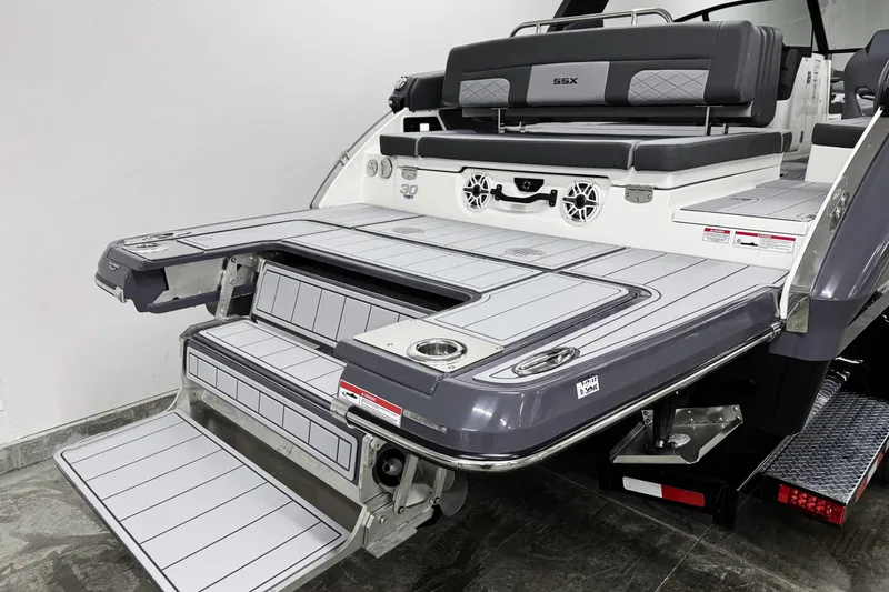 Slide: The Image of 2026 Chaparral 30 SSX boat with sleek swim platform and luxurious seating. - 4