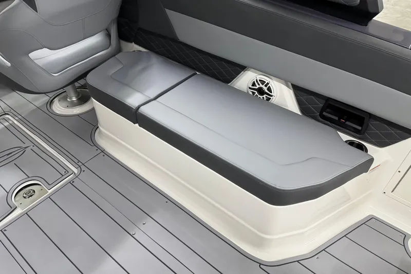 Slide: The Image of 2026 Chaparral 30 SSX boat interior with gray seating and speaker system. - 41
