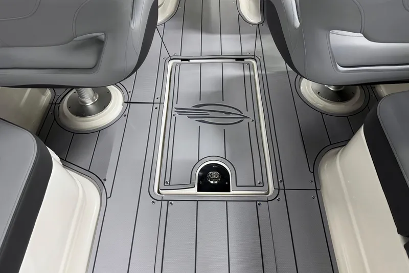 Slide: The Image of 2026 Chaparral 30 SSX boat interior with sleek gray flooring and seating. - 46