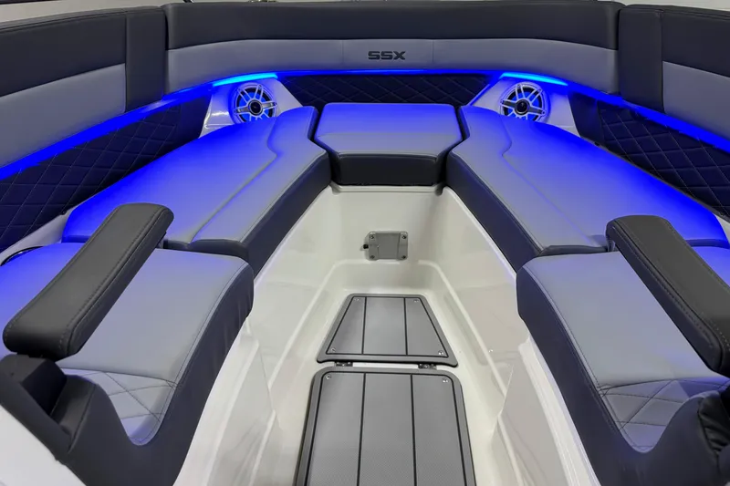 Slide: The Image of Luxurious interior of 2026 Chaparral 30 SSX boat with blue LED lighting. - 55
