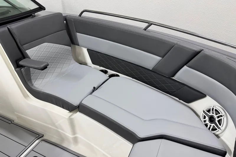 Slide: The Image of 2026 Chaparral 30 SSX boat interior with sleek gray seating and modern design. - 58