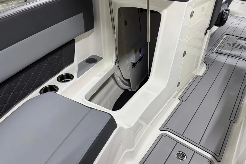 Slide: The Image of 2026 Chaparral 30 SSX boat interior with seating, storage, and modern design features. - 62
