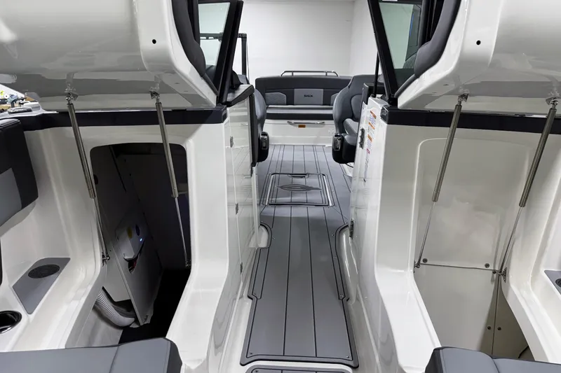 Slide: The Image of Interior view of 2026 Chaparral 30 SSX boat, featuring sleek seating and modern design. - 63