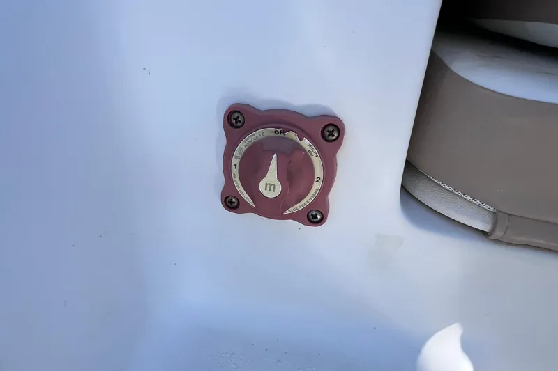 Slide: The Image of Battery switch on a 2013 Carolina Skiff 218 DLV boat. - 14