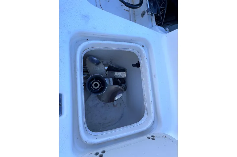 Slide: The Image of Storage compartment with propeller in 2013 Carolina Skiff 218 DLV boat. - 17
