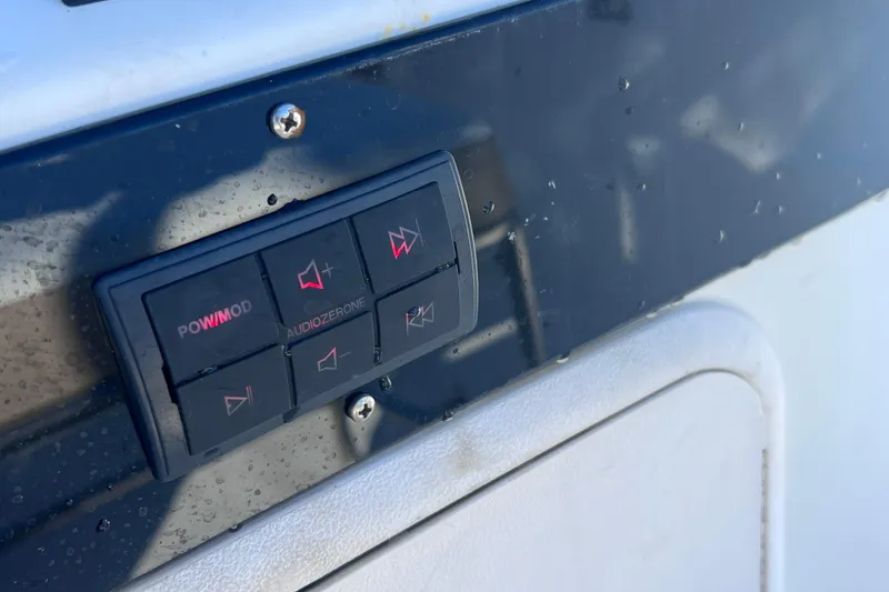 Slide: The Image of Control panel on a 2013 Carolina Skiff 218 DLV boat dashboard. - 33