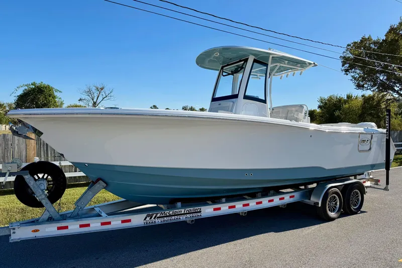 The Image of 2026 Sea Hunt Ultra 275 Coffin Box boat on trailer, side view. - 1