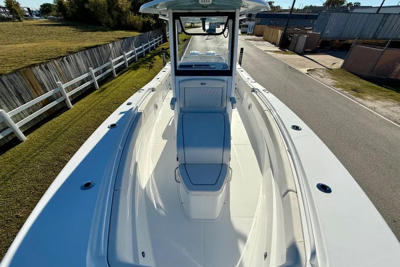 Slide: The Image of 2026 Sea Hunt Ultra 275 Coffin Box boat, spacious deck view, white finish. - 16